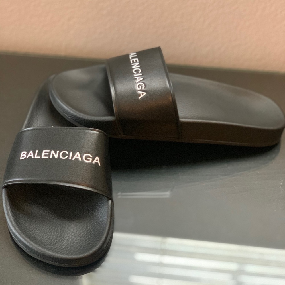 Black leather slides